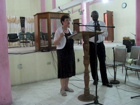 Pastor Debbie preaching at Bizotone